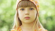 Little girl shows tongue