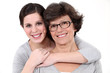 Mother and daughter stood together