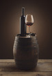 red wine bottle and wine glass on wooden barrel red wine bottle and wine glass on wooden barrel