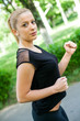 Beautiful teenage girl making exercises in the park in spring Beautiful teenage girl making exercises in the park in spring