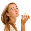 Woman smelling perfume