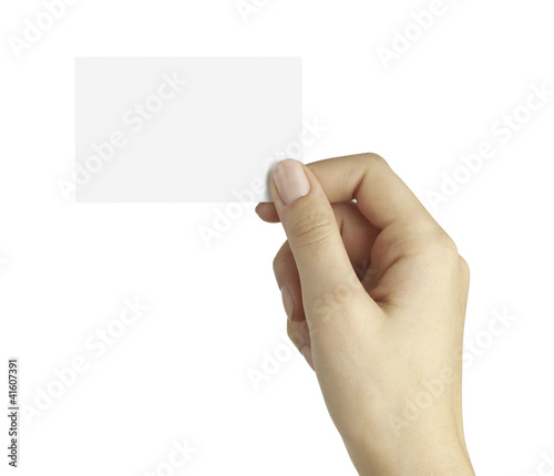 Photo: Woman hand holding blank business card Woman hand holding blank business card