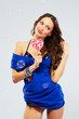 Beautiful joyful woman with a lollipop