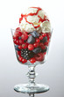 glass of fresh berries with ice cream