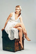 studio portrait of a beautiful woman in white
