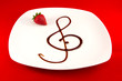 Chiave di violino con aceto balsamico, fragola, musica in cucina
