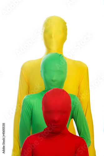 Photo: three colorful people stacked up three colorful people stacked up