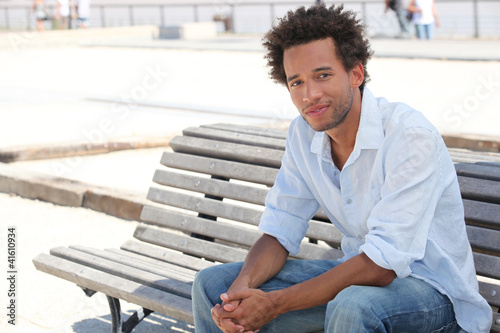Photo: Man sat on bench Man sat on bench