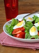 salad with eggs and fresh vegetables, on a plate salad with eggs and fresh vegetables, on a plate