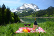 Wine and vegetables served at a picnic