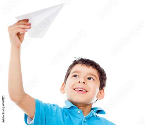 Photo: Boy holding a paper airplane Boy holding a paper airplane