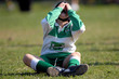 Mini giocatore di rugby disperato