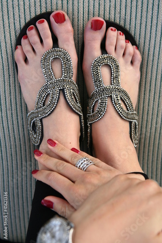 Foto: Frauenfüße in Flip-Flops Frauenfüße in Flip-Flops