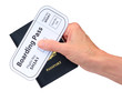 Hand  holding a passport and boarding pass - isolated on white