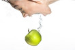 Girl goes for the apple.