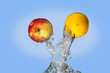 Fruit shooting out of water.