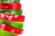 sliced red and green pepper on a white background sliced red and green pepper on a white background
