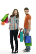 Shopping couple smiling. on white background Shopping couple smiling. on white background