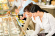 Cafeteria lunch two office woman choose food Cafeteria lunch two office woman choose food