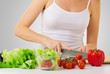 Photo: hand of a woman housewife preparing dinner, vegetables in kitche hand of a woman housewife preparing dinner, vegetables in kitche