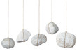 Stone hanging by a string on white, clipping path included Stone hanging by a string on white, clipping path included