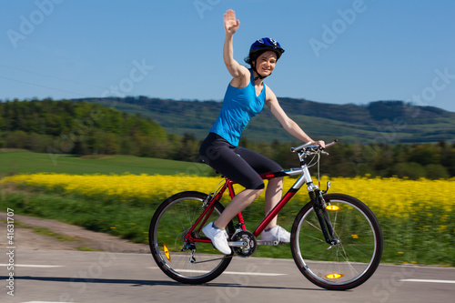 Photo: Woman cycling Woman cycling