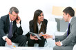 Business people at meeting.