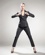 Young angry businesswoman in a fashionable pose Young angry businesswoman in a fashionable pose
