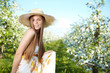 portrait of young lovely woman in spring flowers