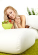 Healthy lifestyle - smiling woman with vegetable salad on white