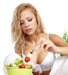 Woman with salad isolated on white