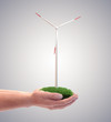 Wind turbine in a man's hand