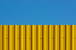 Yellow decking and blue sky