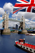Tower Bridge with flag of England in London