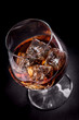 Whiskey / Cognac on black background Whiskey / Cognac on black background