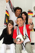 Group of friends supporting the German football team Group of friends supporting the German football team