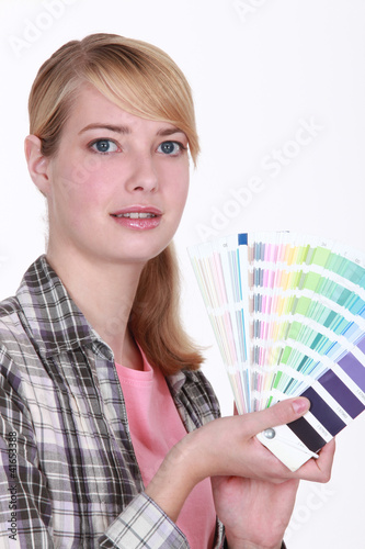 Photo: Woman with a color chart Woman with a color chart