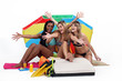 Friends sitting under a beach umbrella Friends sitting under a beach umbrella