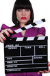 Woman holding up a clapperboard