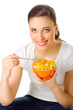 Young woman with fruit salad