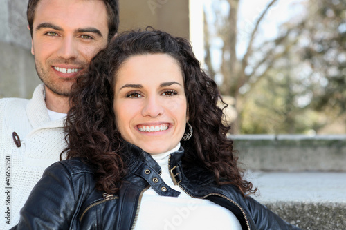 Photo: Couple sat on terrace Couple sat on terrace