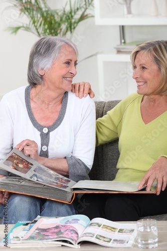 Photo: senior women looking photo album senior women looking photo album