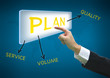 Business hand pointing plan word on button with world map