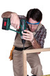 Man using an electric screwdriver