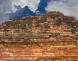 Old brick wall with clouds and sky. Old brick wall with clouds and sky.