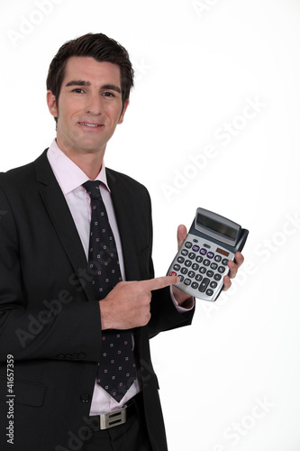 Photo: Businessman with a calculator Businessman with a calculator