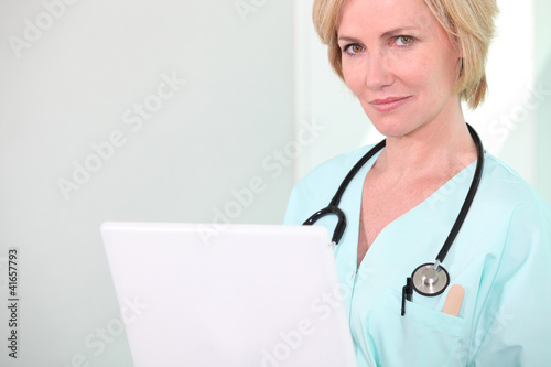 Photo: Portrait of female doctor Portrait of female doctor