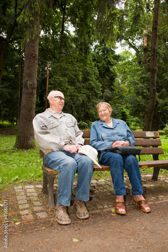 Photo: Happy senior couple in the park Happy senior couple in the park
