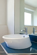 interior bathroom in modern house, sink and mirror