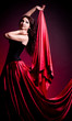 Flamenco Carmen beautiful woman in dress on dark background